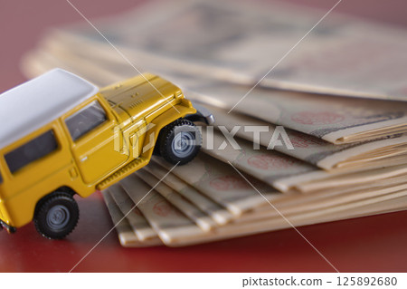 Money and SUVs 125892680