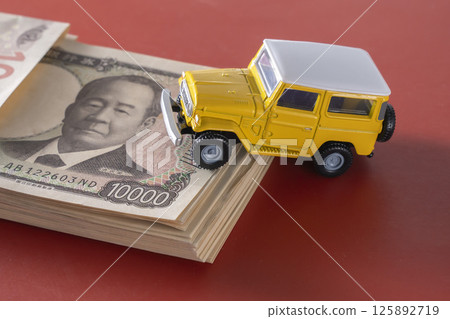 Money and SUVs Money and SUVs 125892719