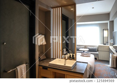 March 24 2025 Hotel Room Interior With Elegant Decor and Comfortable Amenities March 24 2025 Hotel Room Interior With Elegant Decor and Comfortable Amenities 125894569