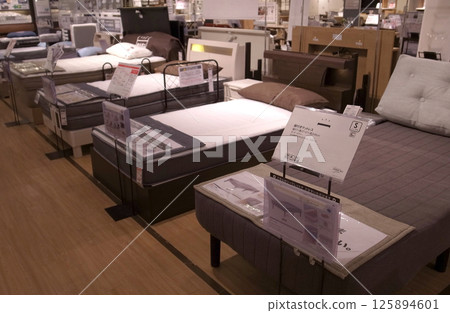 Furniture store bed shopping Furniture store bed shopping 125894601