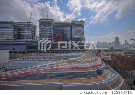 May 4 2025 Urban Cityscape with Modern High-Rises and Under Construction Building May 4 2025 Urban Cityscape with Modern High-Rises and Under Construction Building 125894716