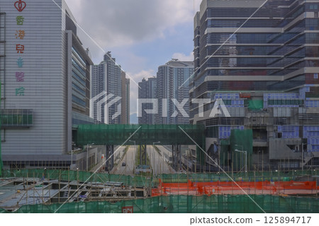 May 4 2025 Urban Cityscape with Modern High-Rises and Under Construction Building 125894717