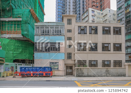 May 5 2025 Residential Building with Rustic Appearance and Large Windows May 5 2025 Residential Building with Rustic Appearance and Large Windows 125894742