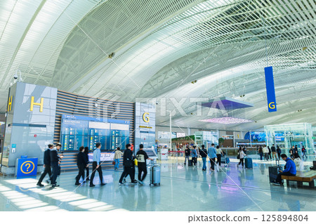 South Korea, Incheon International Airport Departure Lobby (Some parts are in soft focus) South Korea, Incheon International Airport Departure Lobby (Some parts are in soft focus) 125894804