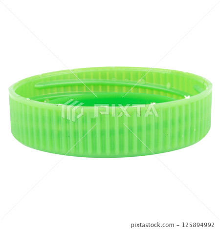 Plastic bottle cap green isolated on white background Plastic bottle cap green isolated on white background 125894992