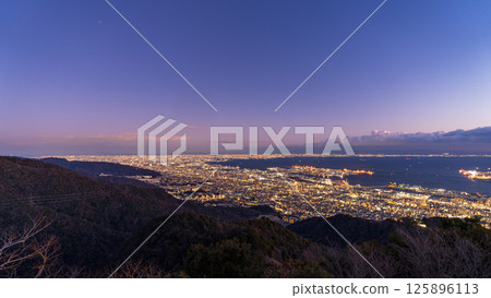 Evening view of the Kobe and Osaka cityscape from Mount Maya's Kikuseidai Evening view of the Kobe and Osaka cityscape from Mount Maya's Kikuseidai 125896113