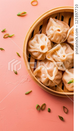Dim sum traditional oriental food steamed bun with bamboo, story background Dim sum traditional oriental food steamed bun with bamboo, story background 125897710