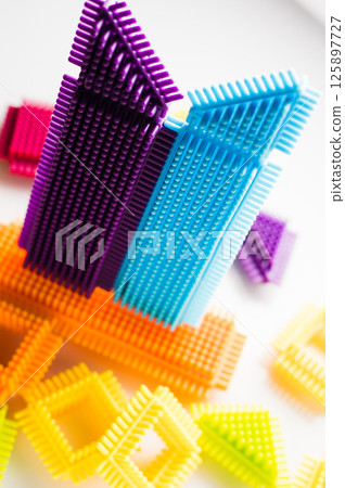 A construction set for younger children consisting of parts of different shapes. 125897727