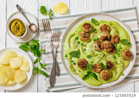 chicken broccoli meatballs with green pea hummus chicken broccoli meatballs with green pea hummus 125897819