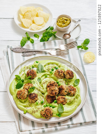 chicken broccoli meatballs with green pea hummus chicken broccoli meatballs with green pea hummus 125897822