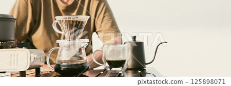Morning coffee concept of cafe focus on nurturing coffee harmony with nature organic seed create warm cup caffeine background green fresh great outdoor aromatic drink rich aroma banner with copy space 125898071