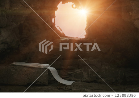 Easter resurrection concept. Jesus Christ resurrection. Empty tomb of Jesus with light. Born to Die, Rise. savior messiah redeemer gospel alive miracle. Christian religion. He is not here he is risen 125898386