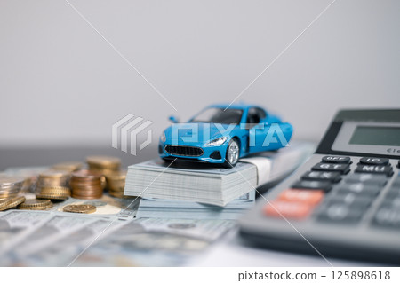 Finance bank tax expense accounting budget money businessman hand for Business expense analysis saving use car Financial calculate accountant close up calculator with graph chart write office desk Finance bank tax expense accounting budget money businessman hand for Business expense analysis saving use car Financial calculate accountant close up calculator with graph chart write office desk 125898618