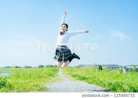 high school girl jumping high school girl jumping 125898733
