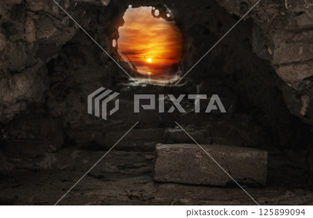 Easter resurrection concept. Jesus Christ resurrection. Empty tomb of Jesus with light. Born to Die, Rise. savior messiah redeemer gospel alive miracle. Christian religion. He is not here he is risen 125899094