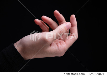 White empty hand of woman, female gesture. Hand holds half-open palm. Space women, one right hand close-up detailed photo White empty hand of woman, female gesture. Hand holds half-open palm. Space women, one right hand close-up detailed photo 125899871