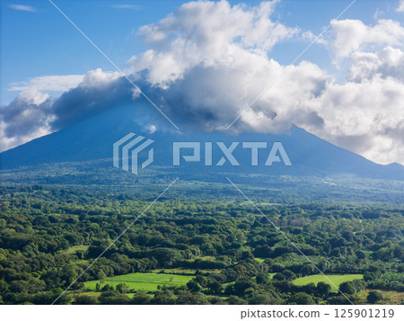 Tall volcano valley field Tall volcano valley field 125901219