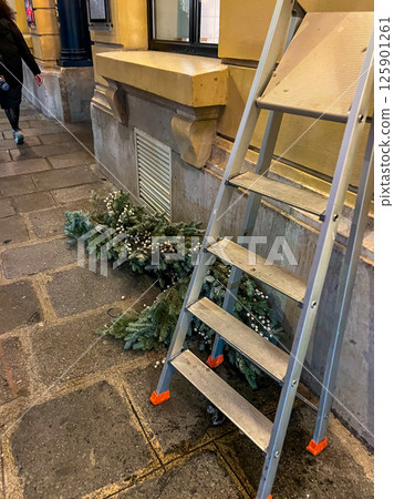 Removal of Christmas decorations in the streets of Paris. High quality photo 125901261