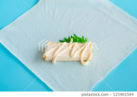 Fried tofu and shiso leaves wrapped in spring roll skin 125901564