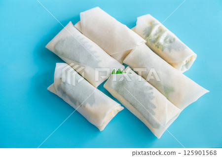 Fried tofu and cheese spring rolls 125901568