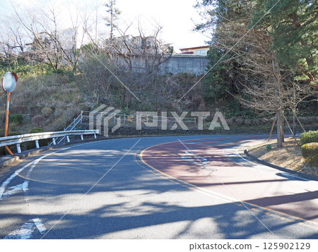 A winding mountain pass in Tokyo. Seiseki-Sakuragaoka. 125902129