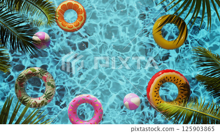 Bright and Colorful Pool Floats Surrounded by Sparkling Water and Lush Green Palms 125903865
