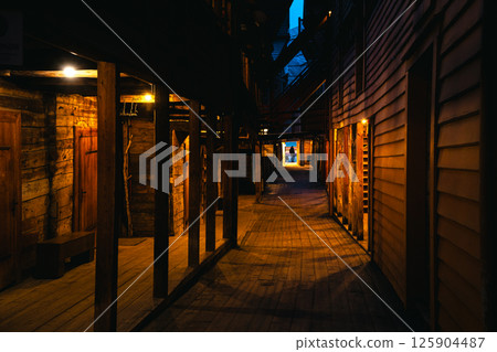 Evening streets and alleys of Bryggen Wharf in Bergen Norway 125904487