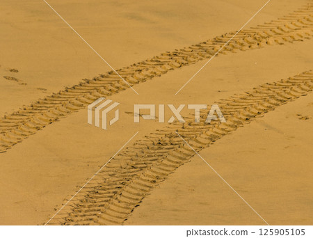 beach sand with pneumatic films beach sand with pneumatic films 125905105
