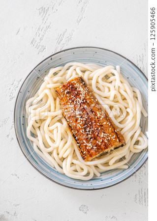 Udon Noodles With Baked Eel And Sweet Unagi Sauce In Bowl Udon Noodles With Baked Eel And Sweet Unagi Sauce In Bowl 125905466