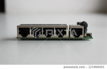 Ethernet ports for connecting network cables on the opened network switch panel Ethernet ports for connecting network cables on the opened network switch panel 125906091