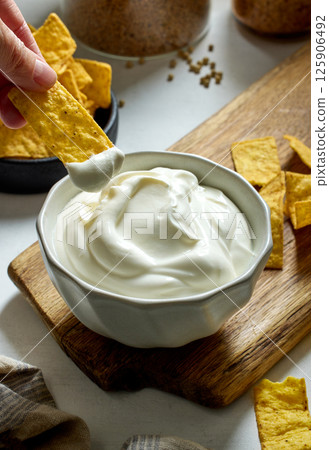 bowl of sour cream yogurt dip 125906492