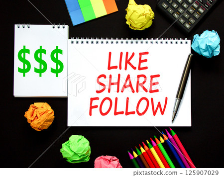 Like share follow symbol. Concept words Like Share Follow on beautiful white note. Beautiful black background. Black pen. Black calculator. Business like share follow concept. Copy space. 125907029