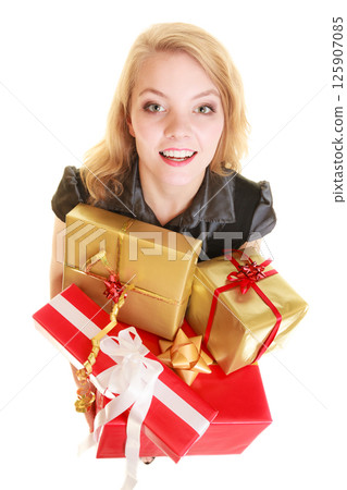 holidays love happiness concept - girl with gift boxes holidays love happiness concept - girl with gift boxes 125907085