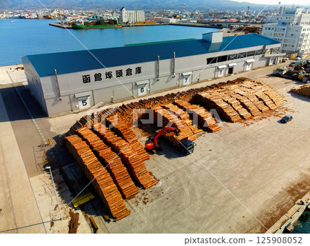 Aerial view of lumber transportation work at Hakodate Port in Hakodate, Hokkaido in spring 125908052