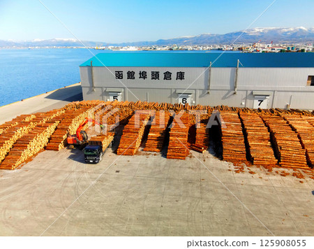 Aerial view of lumber transportation work at Hakodate Port in Hakodate, Hokkaido in spring 125908055