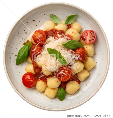 Gnocchi with tomato sauce basil and parmesan cheese view from the top isolated Gnocchi with tomato sauce basil and parmesan cheese view from the top isolated 125910137
