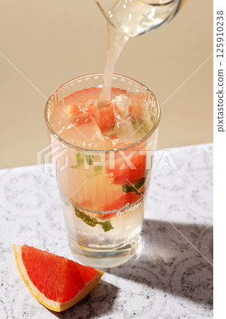 glass of grapefruit mocktail glass of grapefruit mocktail 125910238