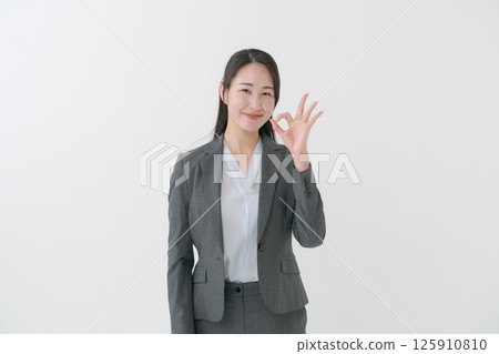 Woman in a suit Woman in a suit 125910810