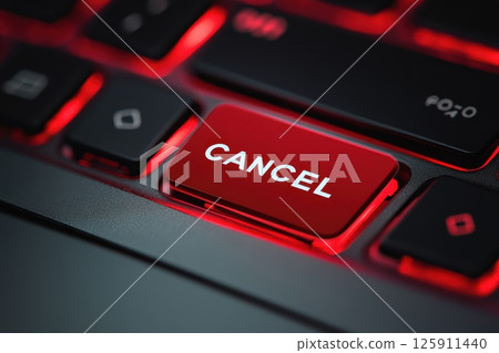 Cancel word on a red enter key of the black pc keyboard. Concepts of cancel culture, ostracism and call-out culture social media and in the Internet. Computer enter key with message. 125911440