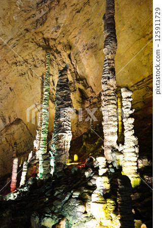Magnificent Stalactites and Stalagmites Inside Huanglong(Yellow Dragon) Cave, Zhangjiajie, China Magnificent Stalactites and Stalagmites Inside Huanglong(Yellow Dragon) Cave, Zhangjiajie, China 125911729