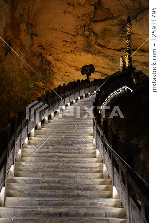 Illuminated Staircase Leading into the Mystical Huanglong Cave, Zhangjiajie, China 125911795