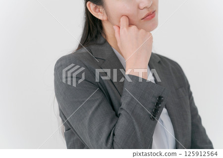 Business woman in troubled look Business woman in troubled look 125912564