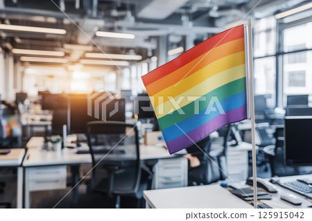 Pride Flag Hanging in an Office Space Symbolizing Inclusivity and Diversity 125915042