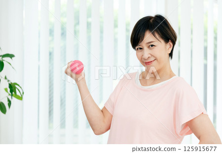 Middle-aged women doing training Middle-aged women doing training 125915677