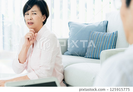 Middle-aged women who are dissatisfied with their husbands 125915775