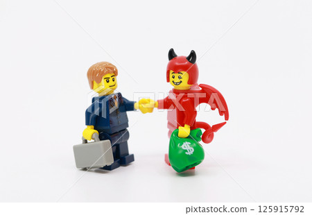 business man make a deal with devil 125915792
