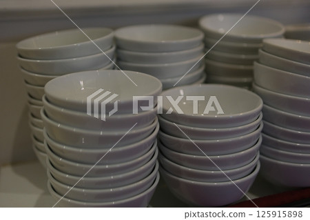 Beautiful Stacked White Bowls Close-Up 125915898