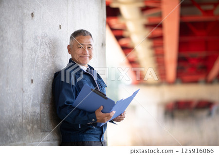 Veteran construction manager and architect Veteran construction manager and architect 125916066