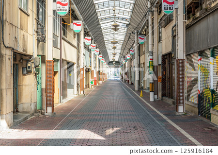 A deserted shopping street with no people around (image) A deserted shopping street with no people around (image) 125916184
