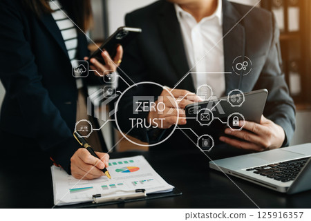 Zero trust security concept Person using computer and tablet with zero trust icon on virtual screen of Data businesses.in office 125916357